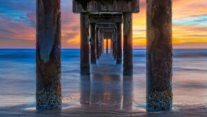 Shot under the pier at sunrise in St Augustine, Florida.